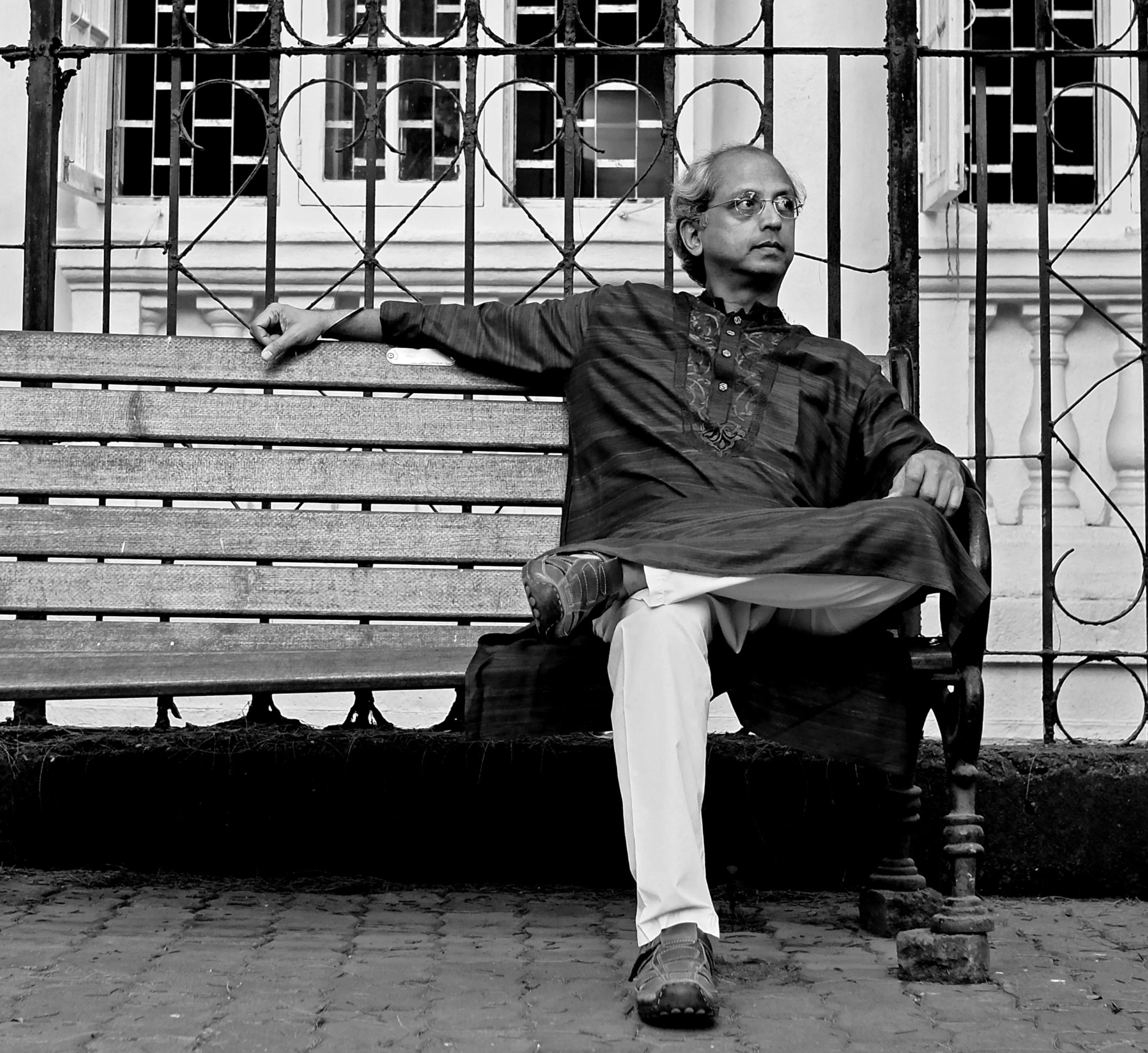 Yogesh Samsi sitting at a park bench