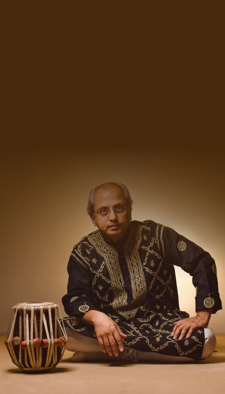 Yogesh Samsi sitting with his tabla